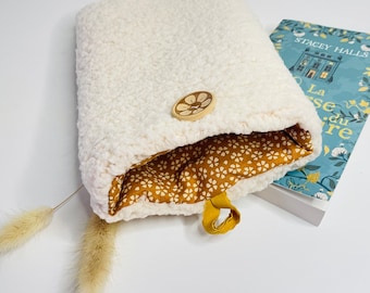 Fleece book cover with button closure, pocket-sized book protection cover. Ecru sherpa fleece
