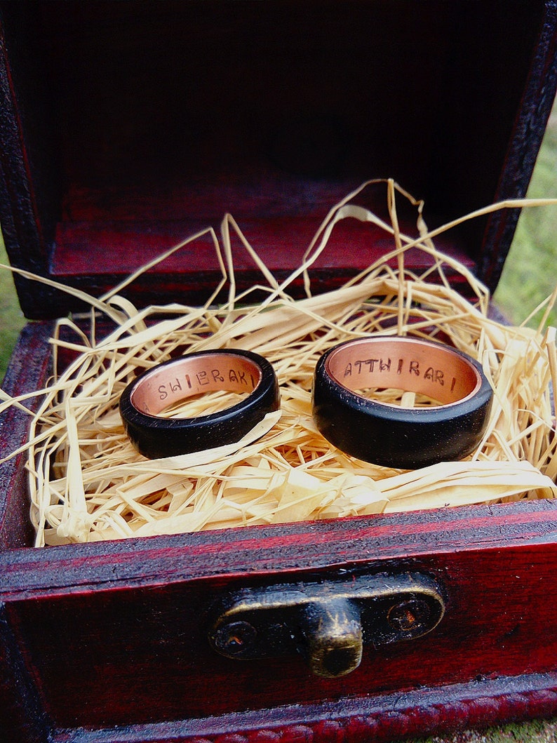 Yer Jalan Atthirari Anni Shekh Ma Shieraki Anni Moon of my life My sun and stars rings Ebony and copper rings geek wedding rings