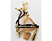 Danecraft Lady with Headphones on the Elliptical 2-Tone Gold Plated Brooch Pin Vintage Like New, Black Enamel