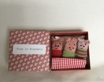 Handmade pigs  in blankets, pink/ green/ red theme