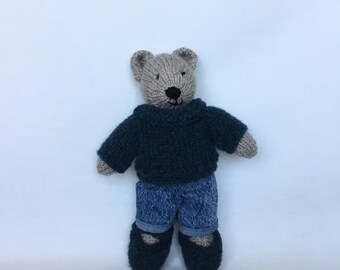 Handmade beige knitted bear, navy/ turquoise jumper and shoes ,  mixed blue jeans.