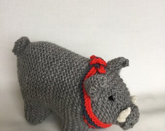 Grey wild boar with white tusks, teal and red scarf.