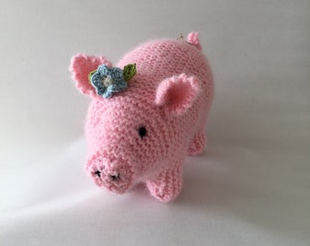 Handmade pink fluffy sparkly piggy with  blue flower.