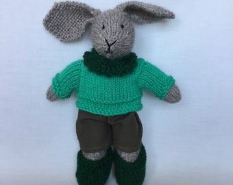 Handmade beige knitted bunny , mid green jumper, dark green scarf and shoes, khaki trousers