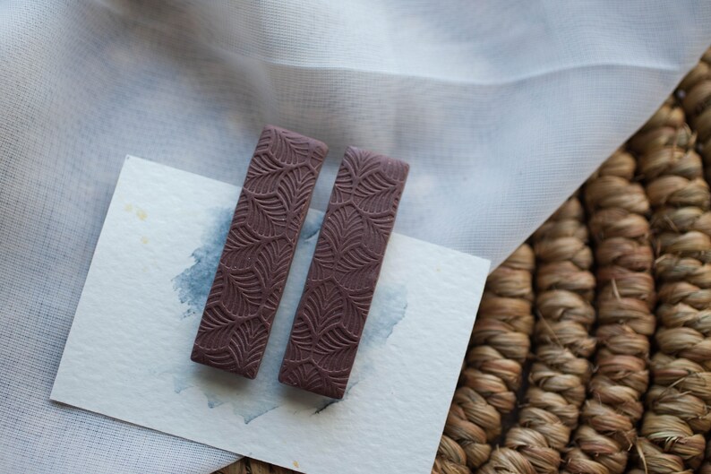 set of 2 Dark Chocolate brown with a leaf textured surface Medium Polymer Clay Hair Clips