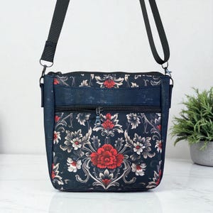 Handmade lovely purse or bag in  cork and cotton. Roomy front pocket and zippered pocket Interior zipper and slip pockets Adjustable strap