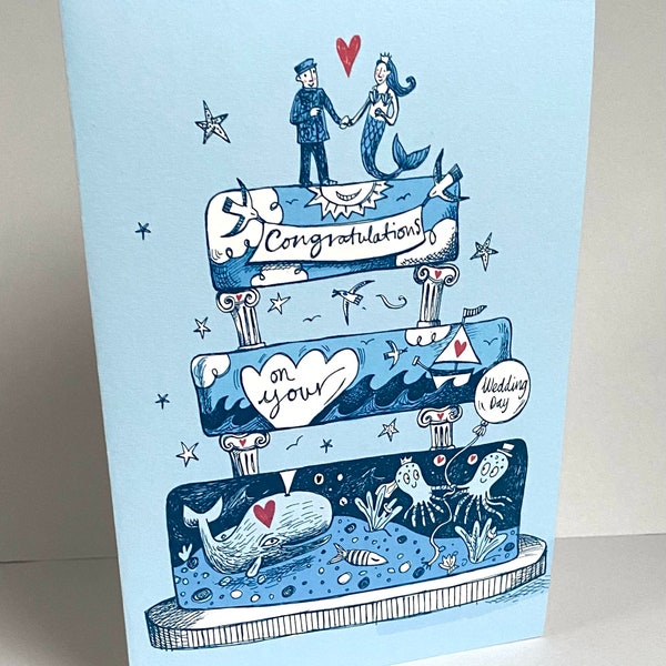 Congratulations on your wedding card - A5- a fisherman and his mermaid bride on a sea themed cake.