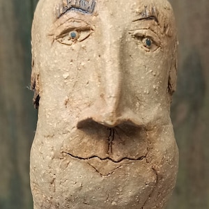 Character head, head made of clay, ceramic, figure, hand-formed, painted, double-fired, frost-resistant, with wooden pedestal. Rolf