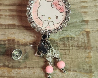 Kitty retractable badge holder