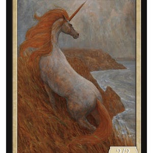 May include: A fantasy art card featuring a unicorn with a flowing red mane and tail, standing on a cliff overlooking the ocean. The card has the text "UNICORN" at the top and "2/2" at the bottom. The artist's name is "MARC FISHMAN".