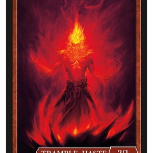 May include: A fiery red elemental creature with a humanoid form and a head of flames. The creature is standing on a base of fire and has a dark red background. The text "Elemental" is at the top of the card and "Trample, Haste 2/1" is at the bottom. The card is from "Series 2" and is "Token 96 © 2022".