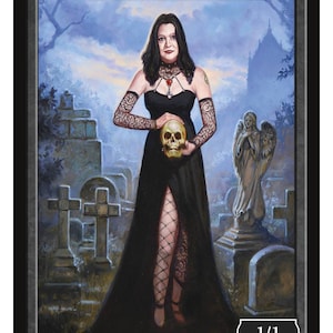 May include: A black and white illustration of a vampire woman holding a skull in a graveyard setting. The card reads "Vampire" and "1/1".