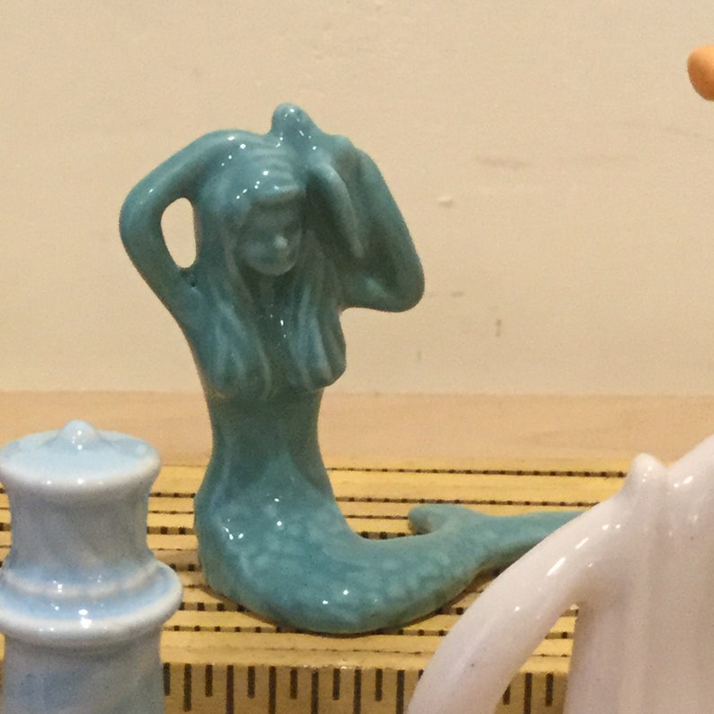 red rose nautical figurines