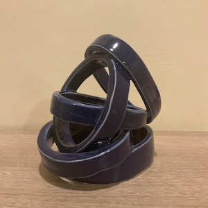 Dark Blue Ceramic Balancing Rings Sculpture: Unique Pottery Decor