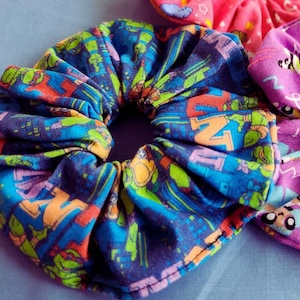 Nineties Style Scrunchies Nostalgic Hair Accessories Collection Handmade Cotton Ties Retro Aesthetic Design Video Game Character Inspired Elements Millennial Gift Idea Vintage Fashion Statement Colorful Pattern Pieces Comfortable Stretch