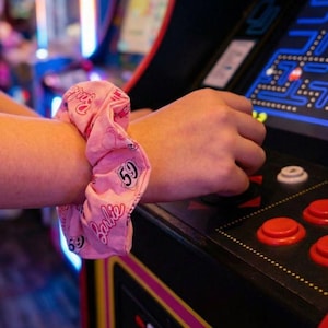 Retro Fashion Accessories Nostalgic Scrunchie Collection Handmade Cotton Hair Ties Video Game Character Inspired Design Nineties Style Aesthetic Millennial Gift Idea Vintage Appeal Colorful Pattern Elements Comfortable Daily Wear Quality
