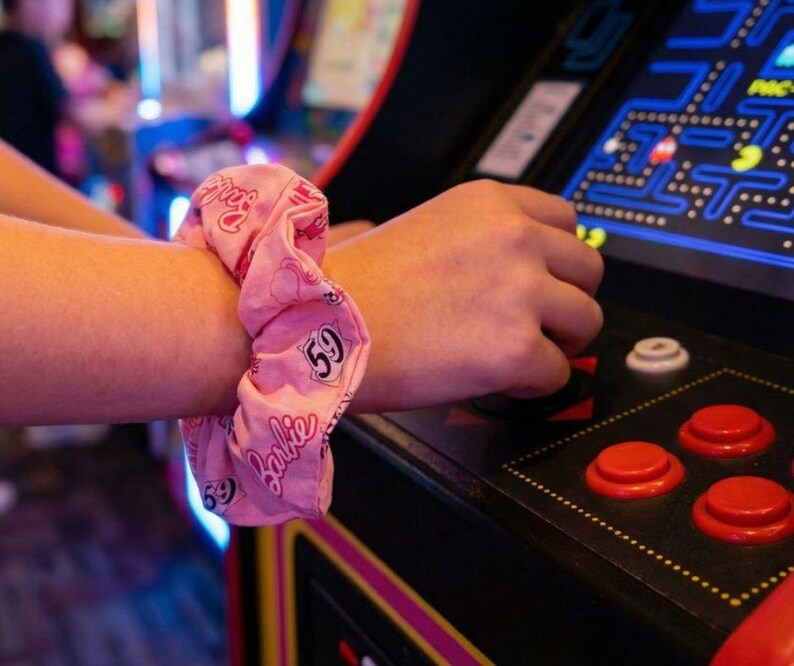 Retro Fashion Accessories Nostalgic Scrunchie Collection Handmade Cotton Hair Ties Video Game Character Inspired Design Nineties Style Aesthetic Millennial Gift Idea Vintage Appeal Colorful Pattern Elements Comfortable Daily Wear Quality