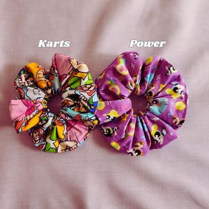 Video Game Character Scrunchies Nostalgic Hair Accessories Retro Style Collection Handmade Cotton Material Nineties Fashion Trend Millennial Aesthetic Design Vintage Inspired Pattern Cartoon Style Elements Colorful Hair Ties Gaming