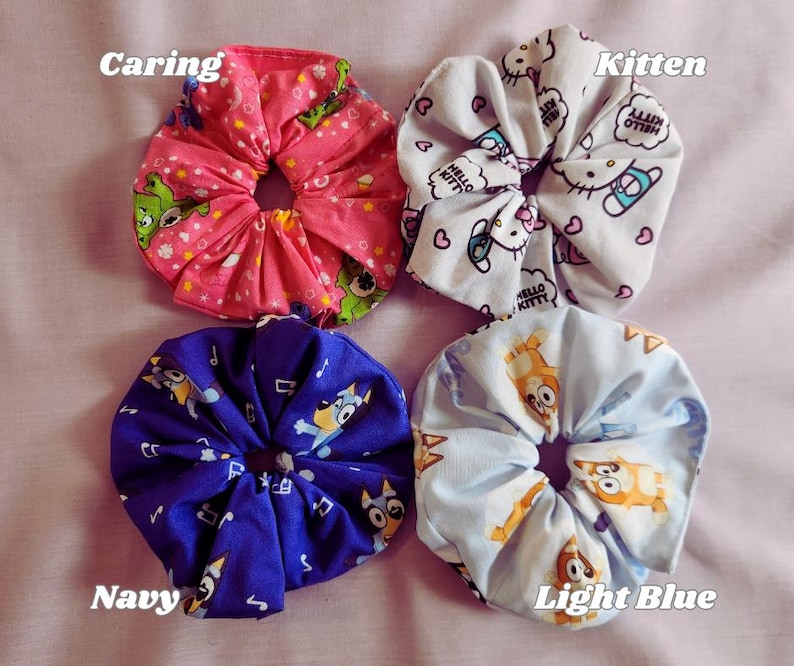 Handmade Cotton Scrunchies Nostalgic Design Collection Retro Aesthetic Hair Ties Video Game Inspired Accessories Nineties Style Fashion Statement Millennial Gift Idea Vintage Look Cartoon Character Elements Colorful Pattern Comfortable