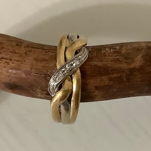 Italian 18K yellow gold and platinum puzzle ring with diamonds