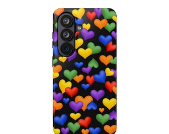 Discreet Pride Rainbow Hearts on Black MagSafe Phone Case | LGBTQ+ Magnetic Case for Galaxy S26 and iPhone from 13 to 17 models