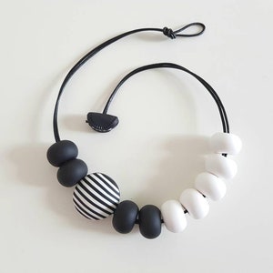 Black and white polymer clay necklace, beaded necklace,striped necklace, modern necklace, asymetrical necklace, polymer clay jewelry