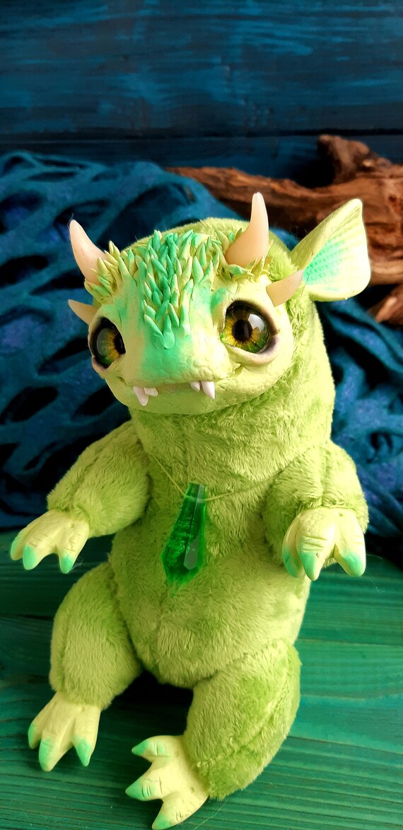 green stuffed dragon