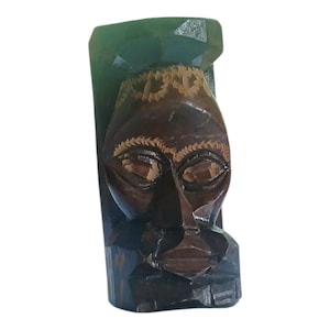Vintage wooden tiki totem pole