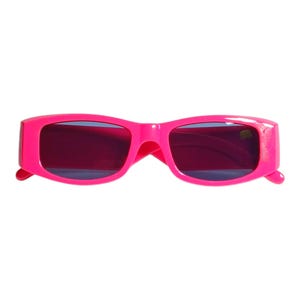 May include: Bright pink sunglasses with rectangular frames and dark lenses. The sunglasses have a thick, bold frame design and a classic, retro style. The glasses are set against a white background.