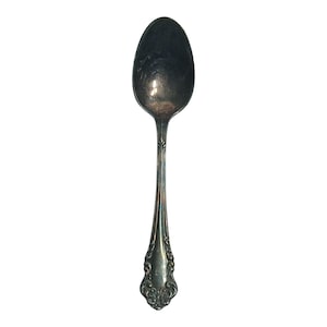 vintage Oneida silverpläterad bit, troligen från deras "Silver Scroll"-mönster eller en liknande utsmyckad blommig rulldesign