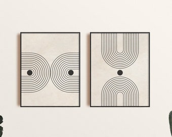 Puede incluir: Dos impresiones enmarcadas en negro con diseños geométricos abstractos en blanco y negro sobre un fondo beige. Los diseños presentan una serie de círculos concéntricos y un punto negro en el centro.