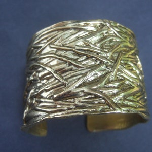 Chic Wide Gilt Metal Textured Cuff Bracelet Designed by Karine Sultan image 2