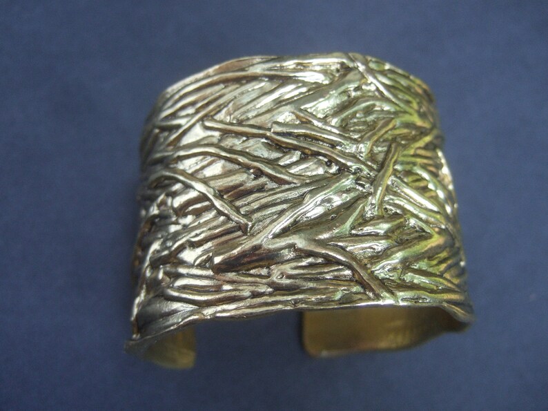 Chic Wide Gilt Metal Textured Cuff Bracelet Designed by Karine Sultan image 2