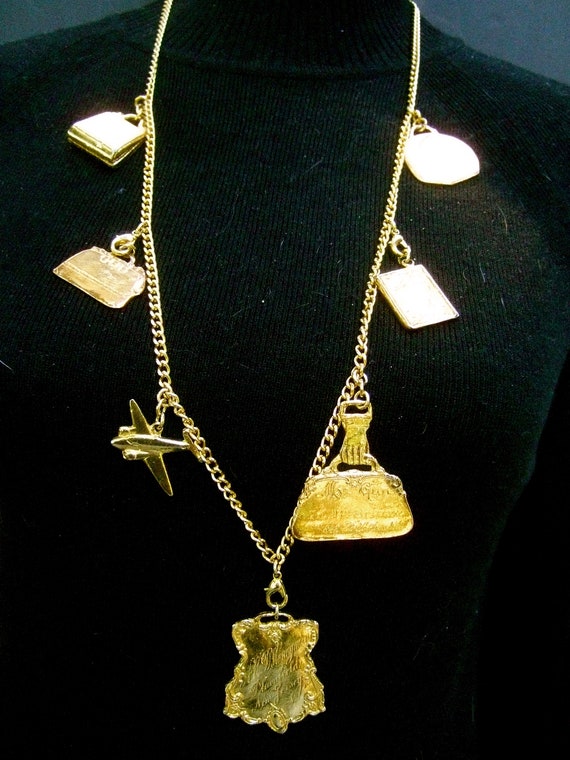 Opulent Gilt Metal Travel Theme Charm Necklace