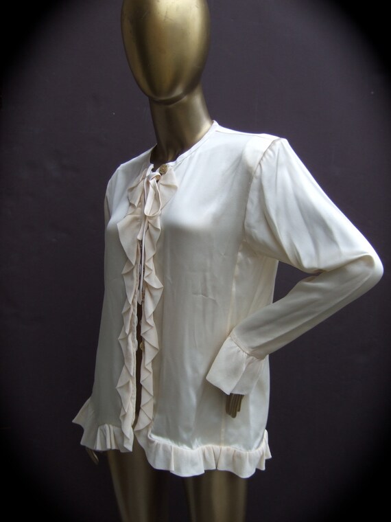 white silk blouse with a frill