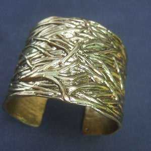 Chic Wide Gilt Metal Textured Cuff Bracelet Designed by Karine Sultan image 3