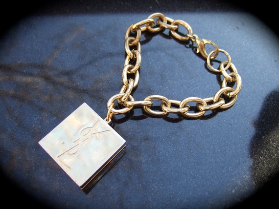 Ysl silver sale charm bracelet