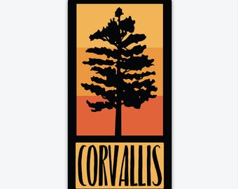 May include: A rectangular sticker with a black pine tree silhouette set against a gradient of orange and yellow. The word "CORVALLIS" is in a bold, yellow font at the bottom, within a black border. The design is clean and modern, suitable for various applications.