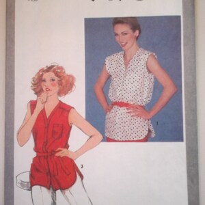May include: Simplicity sewing pattern number 9490 for a sleeveless blouse with a V-neck and a tie belt. The pattern is for size 16 miss.