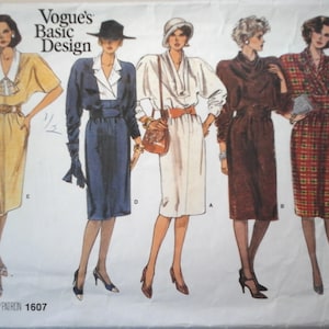 May include: A vintage sewing pattern for five different dress styles. The pattern is Vogue's Basic Design 1607.