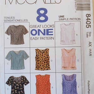 May include: McCall's sewing pattern featuring eight different top designs. The pattern includes a variety of styles, from short-sleeved tops to sleeveless blouses, with different necklines and patterns. The size range is AX (4,6,8).