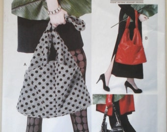 Vogue V8843 Bags in two variations Pattern, handbag pattern, Vogue slouch purses, Vogue messanger bag, Vogue large purse pattern