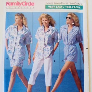 May include: Butterick sewing pattern 6453 for women's clothing. The pattern features three different outfits: a floral print shorts set, white capri pants with a floral shirt, and a striped shorts set. The pattern is rated as very easy.