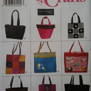 May include: Simplicity Crafts pattern 9963, one size, for making eight different tote bags. The bags are shown in various colors and patterns, including black, red, pink, blue, and white.