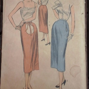 May include: Vintage sewing pattern for maternity skirts, Advance pattern number 6481, with a waist size of 26 inches. The pattern shows two women wearing different styles of skirts, one in a light blue color and the other in a peach color.
