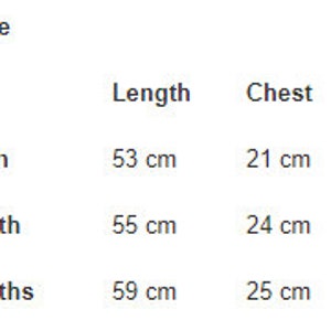 May include: A size guide chart for newborn and infant clothing. The chart lists sizes, lengths in centimeters, chest measurements in centimeters, and arm measurements in centimeters for newborn, 0-3 month, and 3-6 month sizes.