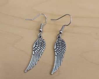 Dangling Silver Angel Wing Charm Earrings with Ear Wire for a Woman.