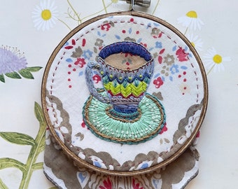 Hand embroidered teacup on antique ladies handkerchief, 4x4 inches, wooden hoop