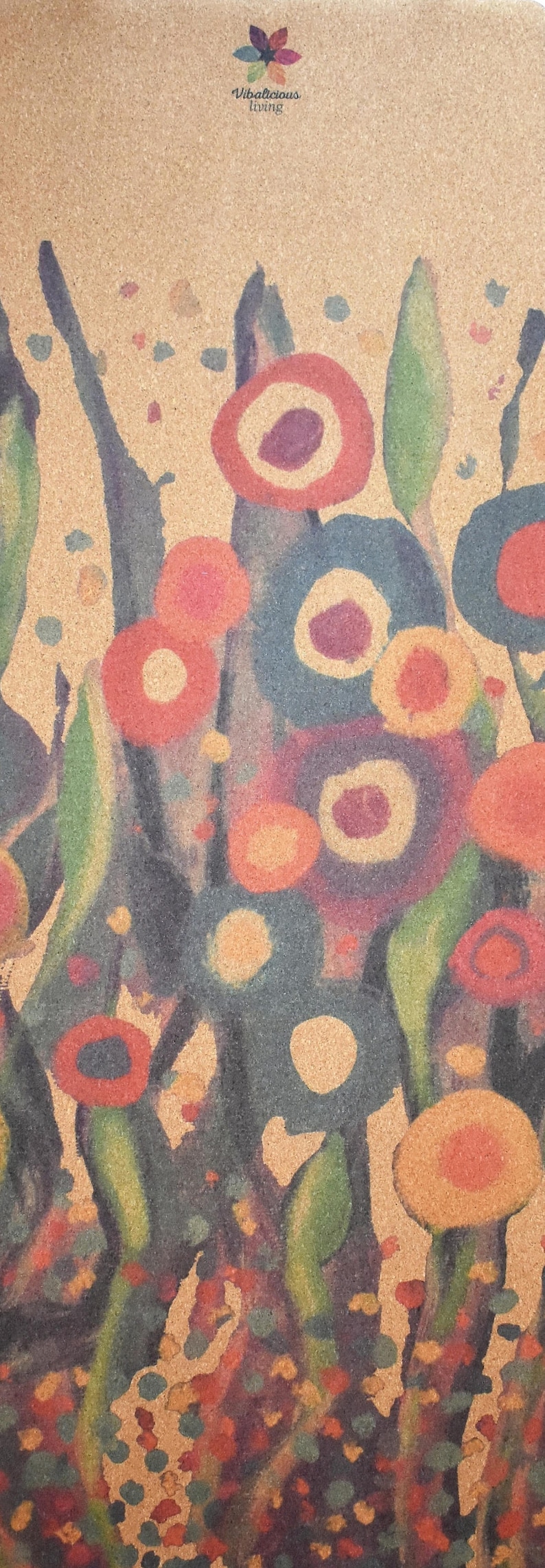 May include: Abstract art print on cork featuring a colorful floral design with red, orange, yellow, green, blue, and purple circles and swirls. The print has the text "Vibalicious Living" at the top.