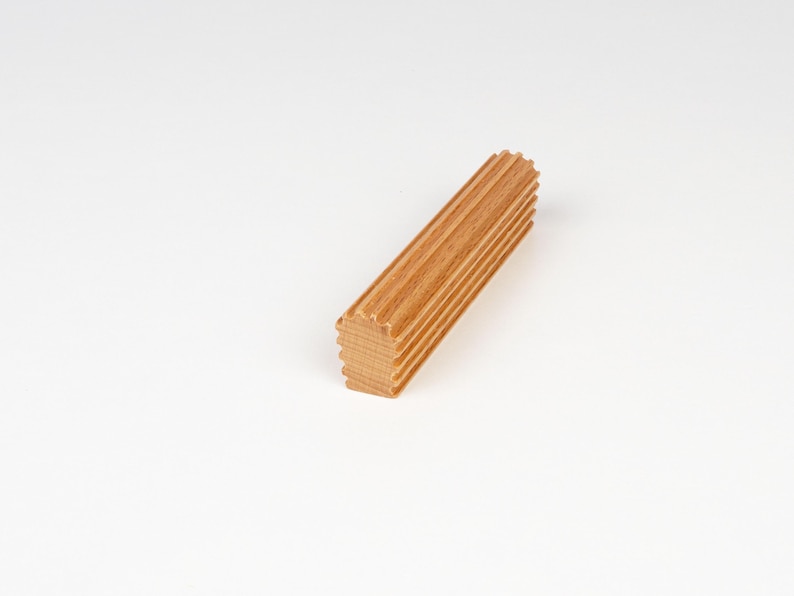 Side view of beech wood cabinet handle showing thickness ribbed design and smooth finish